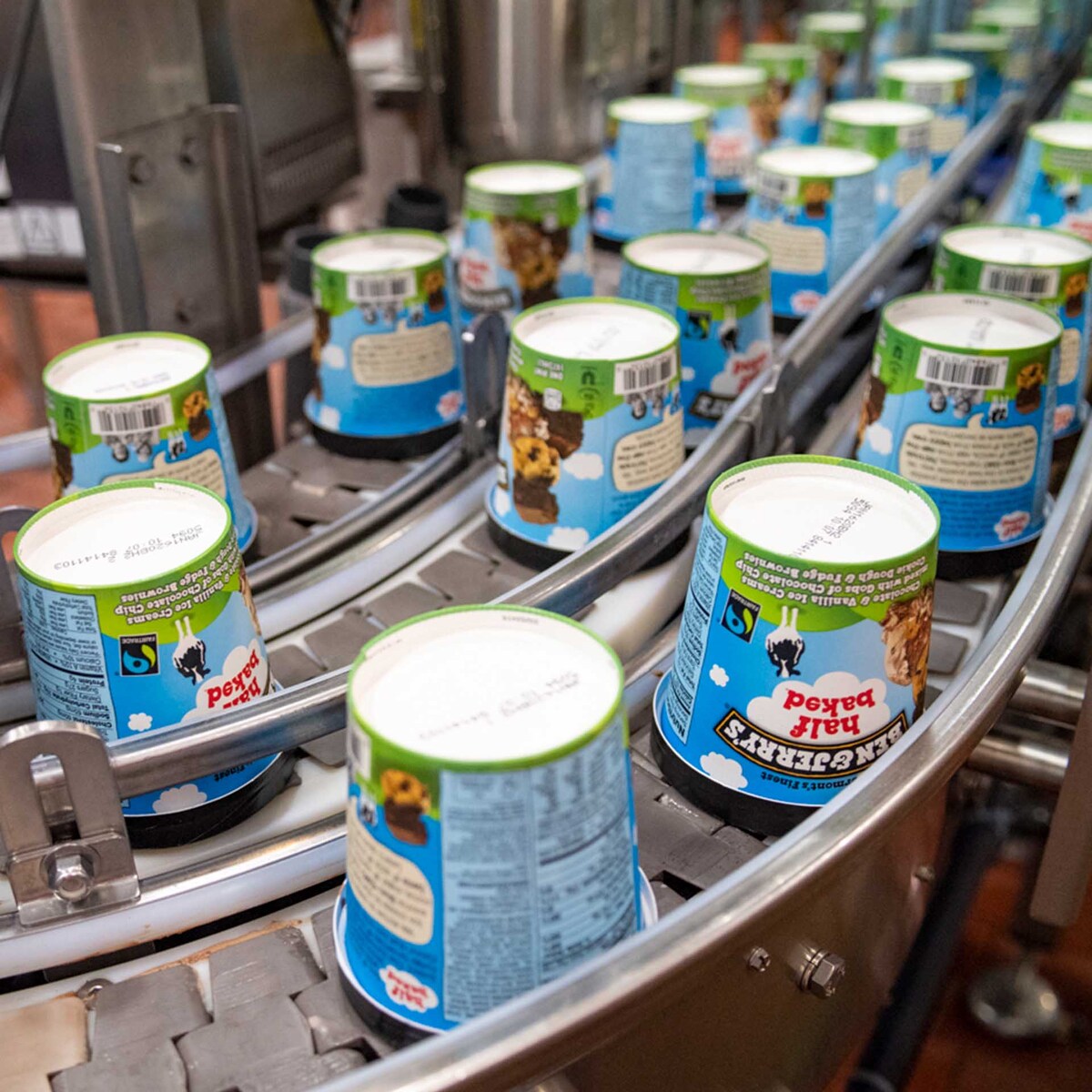 Ben & Jerry's ice cream pints on a factory line